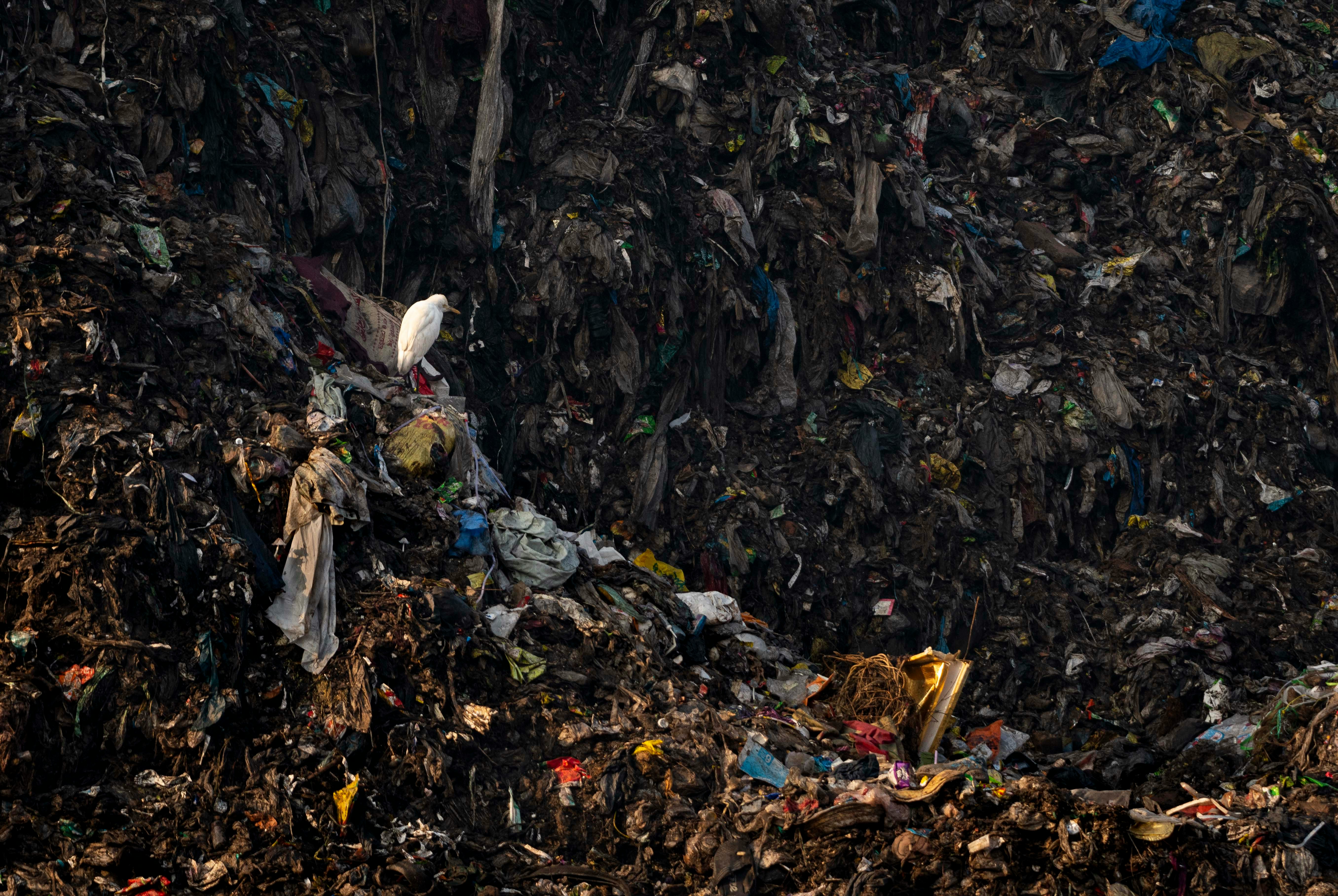 Garbage pile with textiles